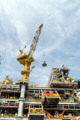 A typical offshore pedestal crane on an oil production platform