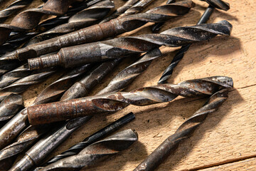 old vintage hand tools - set of drills on a wooden background