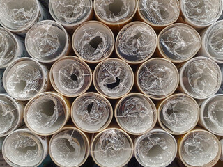 A bundle of rolls of brown paper.