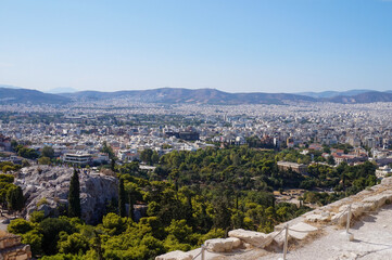 Fototapeta na wymiar Looking over the city of Athens from the Acropolis, with the Temple of Hephaestus in view