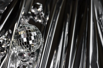 Christmas decoration disco mirror ball on silver background
