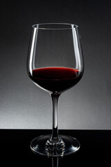 Red wine in wine glass isolated