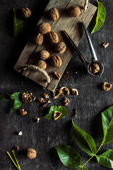 Walnuts on dark vintage table