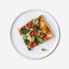 Fresh homemade pizza on a white dish