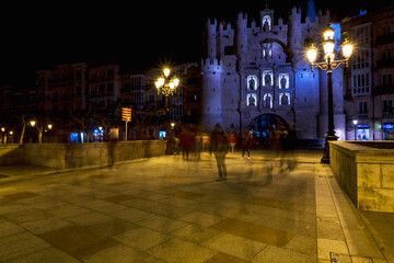 Santa Maria arch on the bridge at night in Burgos (Spain)