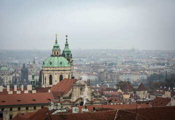 View of St. Nicholas Church and the Vltava River in Prague, the capital of the Czech Republic