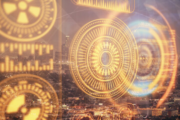 Double exposure of technology theme hologram and cityscape background. Concept of Hightech.