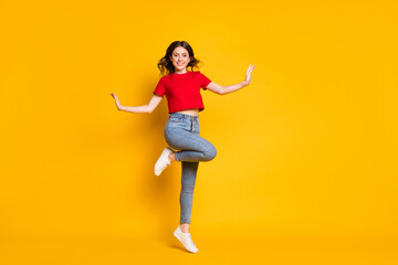 Fototapeta na wymiar Full size photo of candid girl jump wear red clothes footwear isolated over shine color background