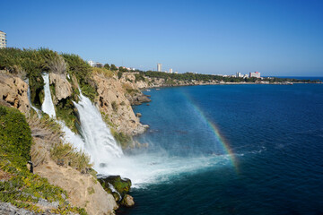 Obraz premium Lower Duden waterfall with rainbow at Antalya, Turkey. Tourism concept, copy space