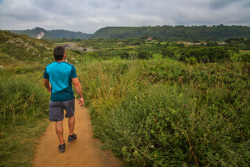 Fototapeta premium Man walking on the cliffs