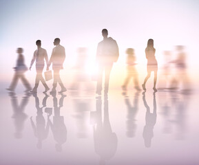 Blurry motion of business people walking in a city