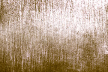 Grunge faded gold textured background