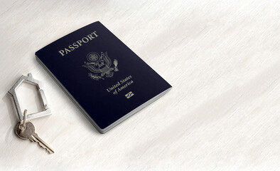 Passport and home key on a wood table ,Space for writing
