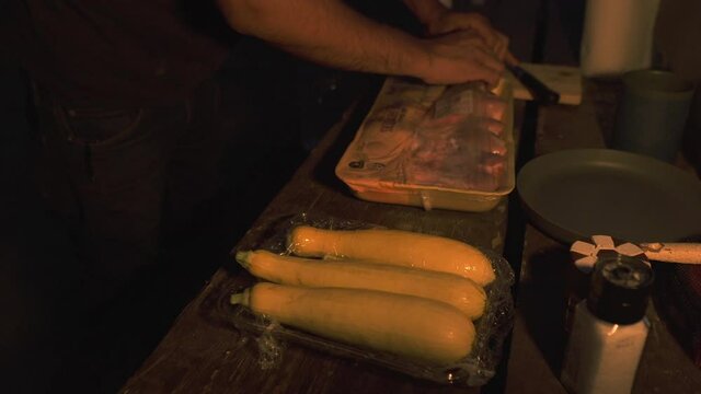 Burning night lamp oil for cooking fish camping closeup 