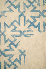 blue paint geometrical pattern on cream background retro