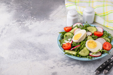 Diet salad with eggs and fresh vegetables. Weight loss concept. Copy space