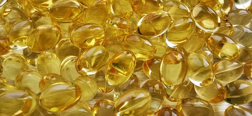 Vitamin D3 capsules. Natural OMEGA-3. A close-up photograph