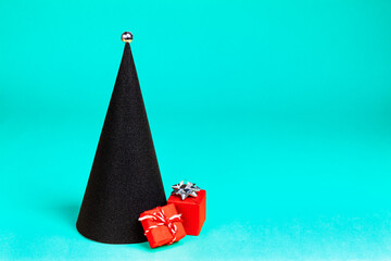 Pop art Christmas tree in the form of a black cone. Red gifts on a blue background.