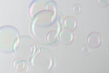 Transparent soap bubble pattern on a gray background wallpaper