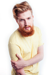 young handsome hipster ginger bearded guy looking brutal isolated on white background, lifestyle people concept