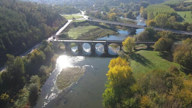 Aerial view of Nineteenth-century bridge over the Yantra River, known as the Kolyu Ficheto Bridge in Byala, Ruse region, Bulgaria