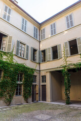 Fototapeta na wymiar Milan, Italy - September , 17 2020: the courtyard of the museum casa of Alessandro Manzoni