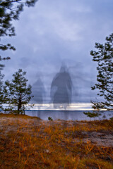 shadow of a man on the bank of the river