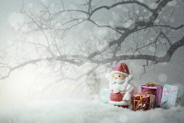 Happy Santa Claus with xmas presents on sunny winter day.Merry Christmas and happy new year concept background.