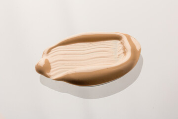Texture of liquid foundation Background made of liquid foundation Make-up concept. Skin Tone Cream