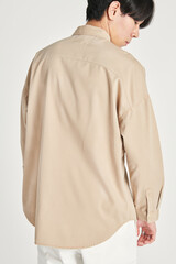 Man in a beige shirt mockup