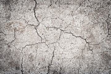 Abstract background with a surface covered with cracks.