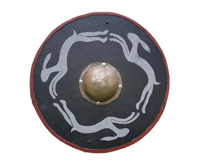 A round wooden shield decorated with paining of Celtic style running hares.