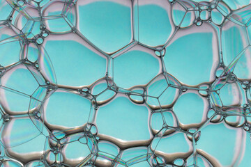 Soap bubbles on the water abstract background.