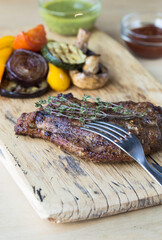 Barbecue Rib Eye Steak or rump steak - Dry Aged Wagyu Entrecote Steak on table
