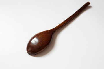 wooden spoon and on white background