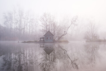 small cottage on the river