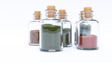 verschiedene Gewürze in Gläsern vor weißem Hintergrund