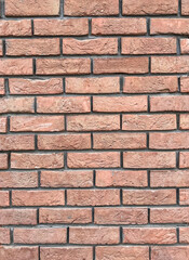 Red brick wall texture, template for wallpaper background closeup view
