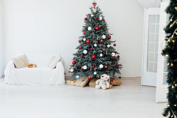 Christmas tree pine with red gifts decor new year feast winter background