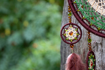 Handmade dream catcher with feathers threads and beads rope hanging