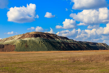 View of slag heaps of iron ore quarry. Mining industry