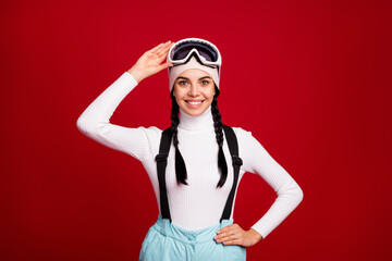 Photo of young happy positve smiling cheerful girl snowboarder ready for winter holidays isolated...