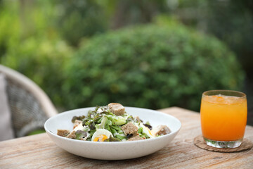 caesar salad appetizer on wooden background