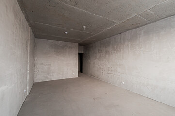 Russia, Moscow- April 17, 2020: interior room apartment rough repair for self-finishing. interior decoration, bare walls of the premises, stage of construction