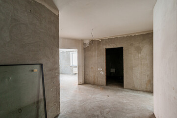 Russia, Moscow- April 17, 2020: interior room apartment rough repair for self-finishing. interior decoration, bare walls of the premises, stage of construction