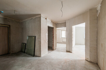 Russia, Moscow- April 17, 2020: interior room apartment rough repair for self-finishing. interior decoration, bare walls of the premises, stage of construction