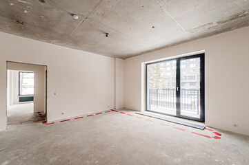 Russia, Moscow- April 17, 2020: interior room apartment rough repair for self-finishing. interior decoration, bare walls of the premises, stage of construction