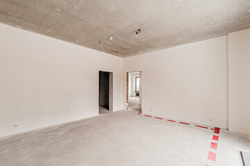 Russia, Moscow- April 17, 2020: interior room apartment rough repair for self-finishing. interior decoration, bare walls of the premises, stage of construction