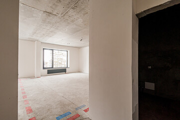 Russia, Moscow- April 17, 2020: interior room apartment rough repair for self-finishing. interior decoration, bare walls of the premises, stage of construction