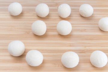 Asian women are making glutinous rice balls